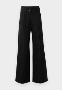 MELANIA - Trousers - black