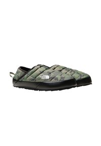 Scarpe slip-on con camouflage nero e verde, dalla parte superiore trapuntata, con fodera imbottita e suola in gomma testurizzata. Presentano un marchio sul lato.