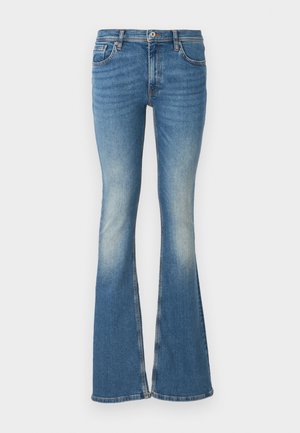 Blue flared jeans with a faded wash, featuring a mid-rise waist, five pockets, and stitched detailing along the edges.