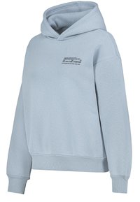 Lichtblauwe hoodie met een relaxed fit, ribgebreide manchetten en zoom. Voorzien van tekstdetails aan de voorkant. Gemaakt van zachte, gestructureerde stof.
