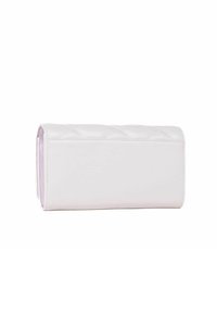 White quilted wallet with a smooth finish, featuring a rectangular shape and a subtle lavender interior. Zipper closure is not visible.