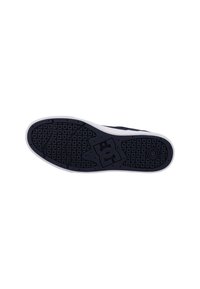 Black rubber shoe sole with a textured grip pattern, featuring a white midsole and a prominent logo design.