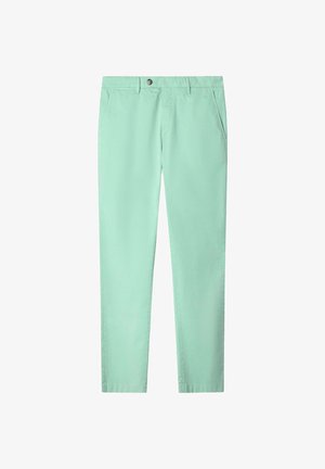 Lichtgroene, rechte broek met lussen voor een riem, knoopsluiting en zijzakken, plat gelegd op een witte achtergrond.
