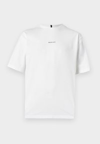 Balta trumpa rankovėmis marškinėliai pagaminti iš medvilnės, su apvaliu iškirpimu ir šiek tiek elastinga medžiaga. Apsaugota maža, centrinė juoda "Oakley" logotipas.