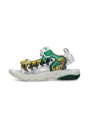 Sandalo bianco per bambini con motivo di dinosauro verde e giallo, punta aperta, cinturini regolabili e suola spessa e strutturata per una buona aderenza.