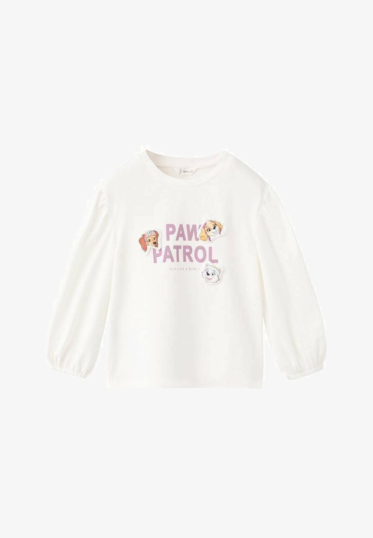 Chemise blanche à manches longues avec manches bouffantes, portant le texte "PAW PATROL" en violet et deux visages de chiens de dessin animé imprimés sur le devant. Tissu doux.
