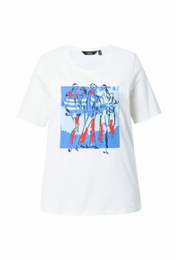 T-shirt en coton blanc avec un motif carré bleu comportant des figures abstraites et des accents rouges. Manches courtes et col rond.