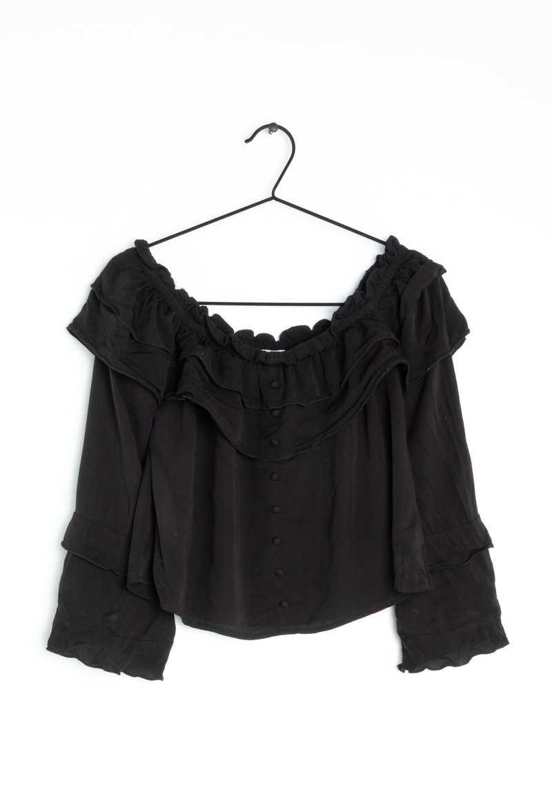 Blusa nera scollata con colletto arricciato e maniche lunghe, con chiusura a bottoni davanti e dettagli a scallop all'orlo.