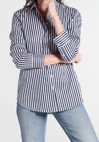 Navy and white striped button-up shirt with long sleeves, featuring a classic collar and small floral accents on buttons and cuffs.