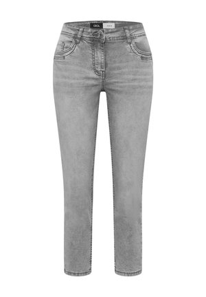 Jean en denim gris clair avec bouton et fermeture éclair à l'avant, style cinq poches, coupe slim, étiquette "Cecil Denim" à l'intérieur de la ceinture.