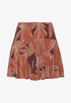 Ein ausgestellter, knielanger Rock aus einem rostoranfarbenen Stoff mit einem cremefarbenen Blattmuster und einem elastischen Bund für zusätzlichen Komfort.