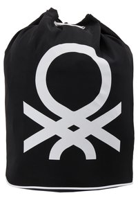 Sac à cordon noir en tissu durable présentant un grand motif graphique blanc avec des formes circulaires et des intersections.