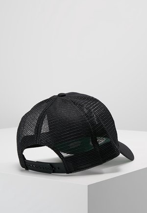 Black mesh trucker cap with adjustable snapback strap displayed on white surface, shown from rear angle.