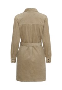 Robe longue à manches longues en velours côtelé beige avec ceinture, poignets boutonnés et col, vue de dos sur fond blanc.