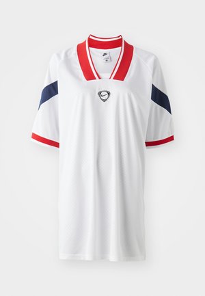 White athletic jersey featuring red and navy accents, V-neck collar, short sleeves, and a mesh texture with a logo detailing at the chest.