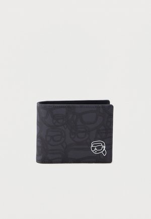 Black wallet featuring a patterned design of eyeglasses. It has a white graphic detail of a face wearing glasses and a bandana.