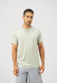 Nike Performance TEE RESET - T-skjorte til trening - jade horizon