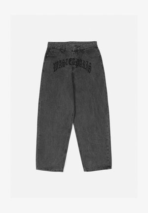 Blugi baggy cu talie înaltă, de culoare gri închis, cu finisaje estompate. Prezintă textul negru "WASTE PARIS" pe spate. Design clasic cu cinci buzunare.