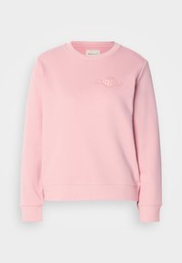 Lichtroze crewneck sweatshirt met lange mouwen en subtiele geborduurde logo op de linkerkant van de borst, geribbelde mouwen en tailleband.