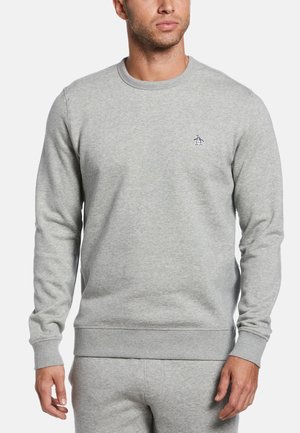 Grijze sweatshirt van zacht materiaal, met een ronde hals en geribde manchetten. Klein pinguïnlogo geborduurd op de linkerborst.