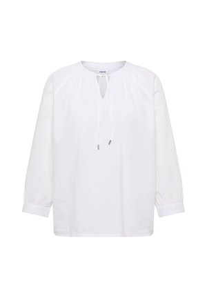 Blouse blanche à manches longues avec encolure froncée, ouverture en trou de serrure et lien à nouer, avec poignets boutonnés et coupe décontractée.