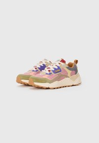 Multicolored sneakers featuring suede and mesh materials, a thick sole, and a mix of pink, green, purple, and gray accents.