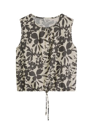 Crop top crème sans manches avec motif floral noir, encolure ronde et lien ajustable à l'ourlet.