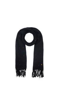 Czarny wełniany szalik z wielobarwnymi małymi kropkami, z frędzlami na końcach oraz małą złotą metką z logo z jednej strony, złożony w pętlę.