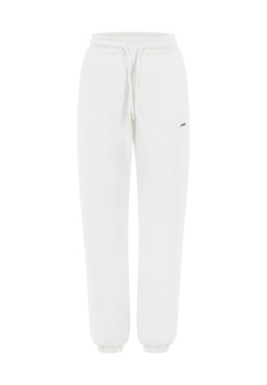 Pantalones de chándal blancos hechos de una tela suave, con una cintura elástica y cordón ajustable, y puños acanalados en los tobillos. Detalle sutil del logo.