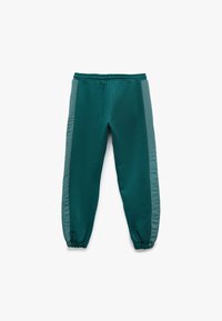 Teal joggers met een elastische tailleband, taps toelopende boorden en getextureerde zijkanten. Zachte stof met gladde accenten, geschikt voor casual dragen.