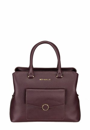 Sac à main en cuir marron avec doubles poignées, doté d'une poche avant et d'accents dorés. Surface texturée et détail circulaire en métal.