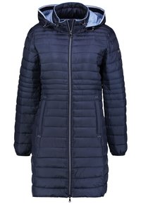 Polstret lang frakke i marineblå, med lynlås lukning, to sidelommer og foret hætte. Glat tekstur med quiltet design.