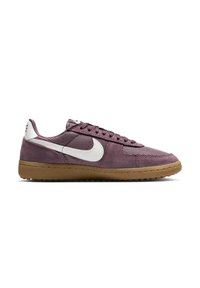 Low-profile purple suede and mesh sneaker with white Nike swoosh and tan rubber sole, viewed from the side on a white background.