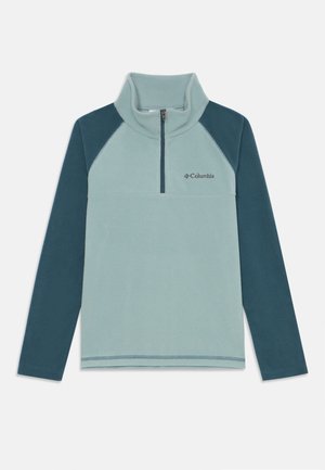 Pull-over en polaire vert clair avec des manches raglan vert foncé. Doté d'un col montant et du logo Columbia sur la poitrine.
