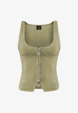 Oliwkowy crop top wykonany z miękkiego materiału, z zamkiem błyskawicznym z przodu, okrągłym dekoltem oraz kontrastowym szwem dla dodatkowego akcentu.
