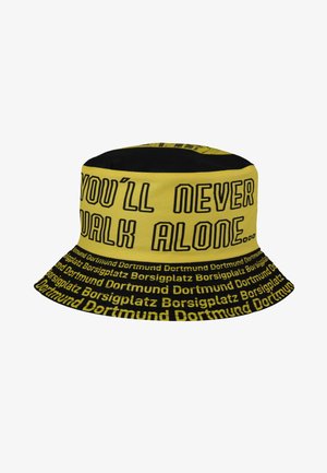 Yellow and black bucket hat with text "YOU'LL NEVER WALK ALONE..." and repeated words "Dortmund Borsigplatz" around the brim.