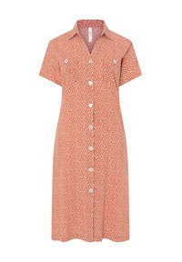 Vestido de manga corta, de longitud hasta la rodilla, en color óxido anaranjado con lunares blancos, que presenta un cierre de botones en el frente y dos bolsillos en el pecho. Material con mezcla de algodón.
