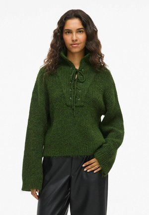 - Sweter