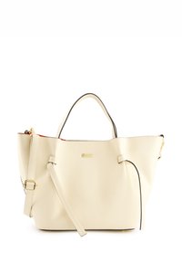 Cremfarbene Leder-Tote mit strukturiertem Finish, kontrastierenden schwarzen Kanten, goldenen Beschlägen und einem abnehmbaren Schultergurt.