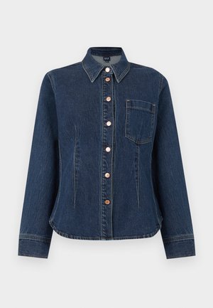 Chemise en denim bleu foncé à manches longues avec boutons, col et une poche poitrine unique, coupe ajustée, boutons de couleur cuivre sur le devant.