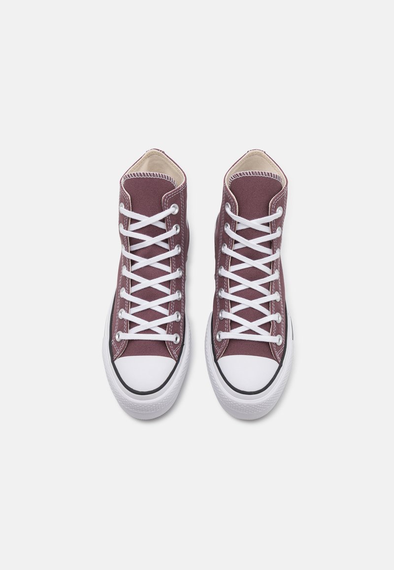 Sneaker alte in tela bordeaux, con lacci bianchi, suole in gomma e punte bianche a contrasto con bordo nero.