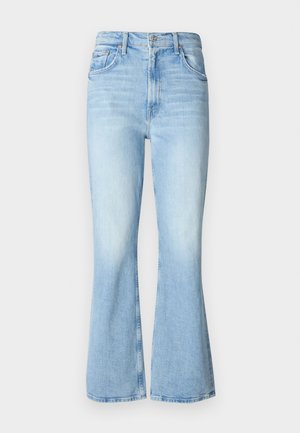 Jean en denim bleu clair, évasés avec une taille haute, présentant un design classique à cinq poches et un léger délavage sur le tissu.