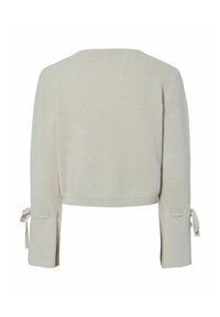 Heledbež ribaga musteriga lühike sviiter pika varrukaga. Varvaste avades on sidumisdetailid ning ümmargune kaelus. Pehme tekstuur kogu ulatuses.