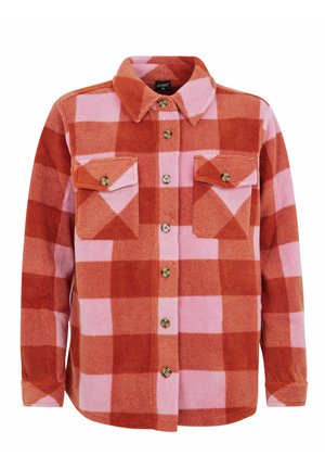 Red and pink plaid flannel shirt featuring a button-up front, two chest pockets, and a collar. Soft texture with contrasting patterns.