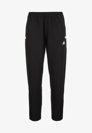 Czarne spodnie sportowe Adidas z elastycznym pasem, zwężanymi nogawkami i białym logo na górnej prawej części uda.