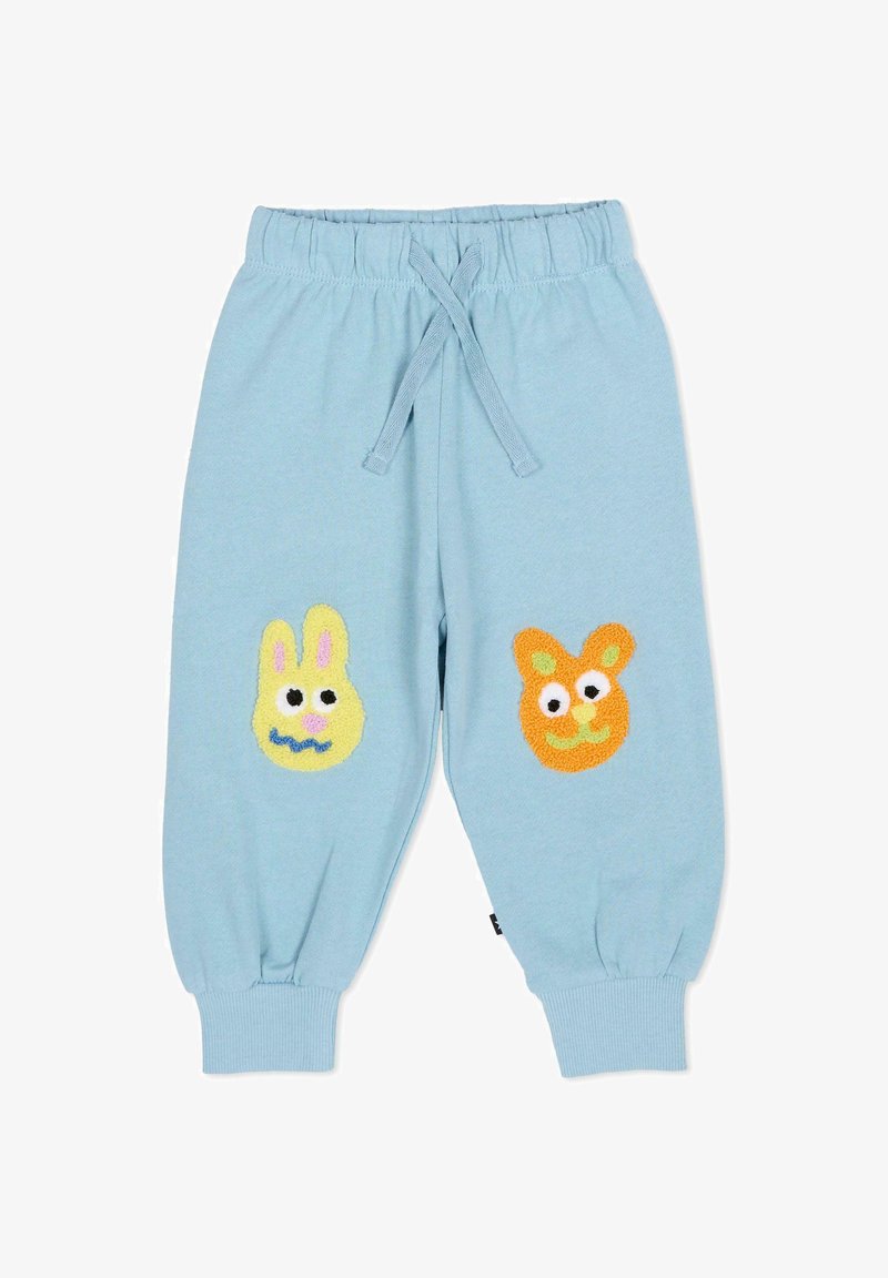 Pantalon de survêtement bleu clair avec une ceinture élastique et un cordon de serrage. Présente deux visages d'animaux brodés : un lapin jaune et un ours orange.