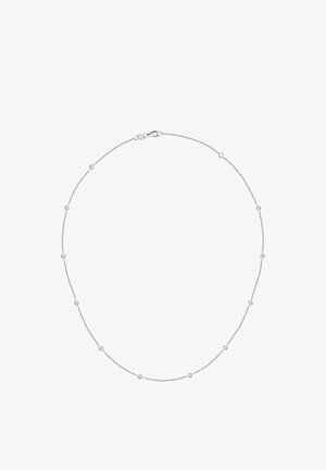 Sølvkæde med små runde accenter fordelt langs kædens længde. Fleksibelt design med lukning med hummerlås.