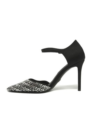 Black pointed-toe high heel shoe with ankle strap and silver rhinestone embellishments on toe area.
