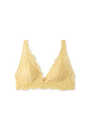Brassière en dentelle jaune pastel avec une forme triangulaire, des bords festonnés et un motif floral ; sans rembourrage ni armature.