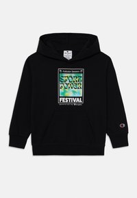 Hoodie noir avec une poche kangourou sur le devant, ornée d'un imprimé graphique multicolore indiquant "SPORT POWER FESTIVAL". Logo sur la manche.